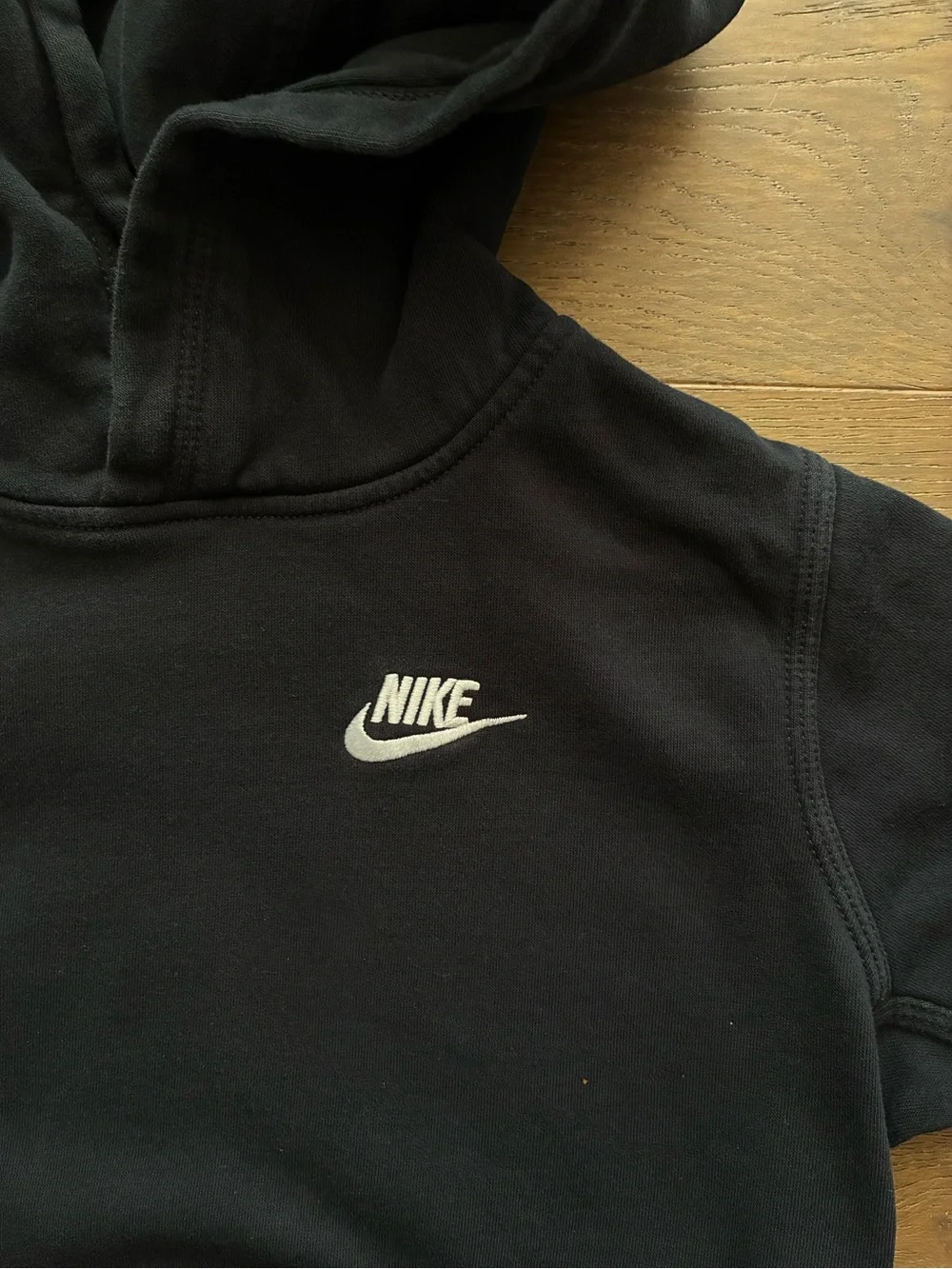 Nike Black Hoodie with White Swoosh Logo